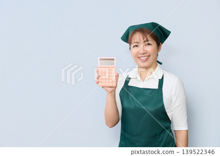 House cleaning staff with calculators House cleaning staff with calculators 139522346