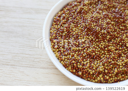 Wholegrain mustard seeds in brine 139522619