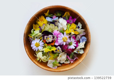 Colorful edible flowers for decorating your beautiful food plates. Colorful edible flowers for decorating your beautiful food plates. 139522739