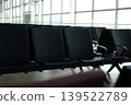 Empty airport waiting chairs near window 139522789