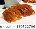 Chinese roasted duck sliced and served on white plate 139522796