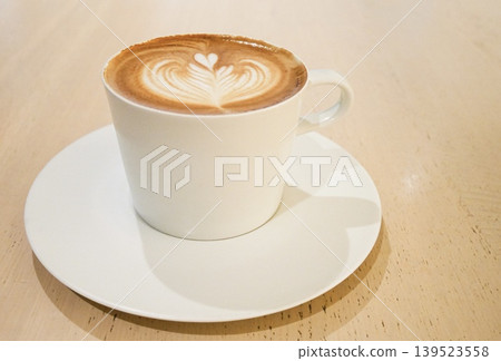 Caffe latte on the table Caffe latte on the table 139523558