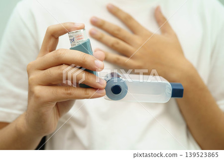 Bangkok, Thailand May 4, 2026 Asthma and chronic obstructive pulmonary disease COPD, Asian teenage using metered dose inhaler MDI. Bangkok, Thailand May 4, 2026 Asthma and chronic obstructive pulmonary disease COPD, Asian teenage using metered dose inhaler MDI. 139523865