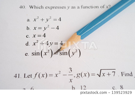 Pencil on mathematic formula exercise test paper in education school. 139523929