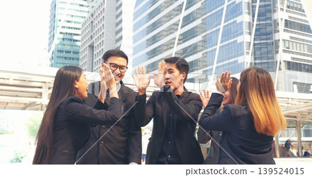 Diversity Teamwork business people friendship holding hands together. Multiethnic Businesspeople teams Solidarity partner. Group of teamwork high five team together success tag team winner partner Diversity Teamwork business people friendship holding hands together. Multiethnic Businesspeople teams Solidarity partner. Group of teamwork high five team together success tag team winner partner 139524015