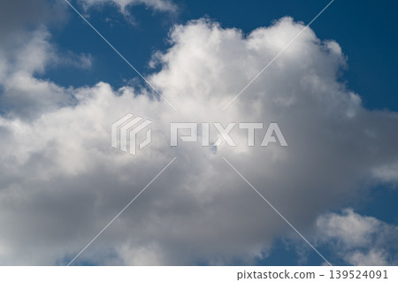 Impressive artistic view of expansive cloud formations with cinematic impact. Striking visual interpretation of large atmospheric cloud structures against expansive sky backdrop Impressive artistic view of expansive cloud formations with cinematic impact. Striking visual interpretation of large atmospheric cloud structures against expansive sky backdrop 139524091