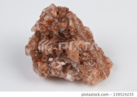Brown crystal cluster photograph. Detailed macro shot of earthy brown aragonite crystals. Studio photograph showcasing welldefined brown aragonite crystal faces with sparkle Brown crystal cluster photograph. Detailed macro shot of earthy brown aragonite crystals. Studio photograph showcasing welldefined brown aragonite crystal faces with sparkle 139524235