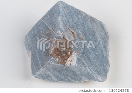 Decorative mineral slab with natural veins and rust coloration. Angelite mineral piece featuring intricate veins and earthy rust accents for metaphysical purposes Decorative mineral slab with natural veins and rust coloration. Angelite mineral piece featuring intricate veins and earthy rust accents for metaphysical purposes 139524278