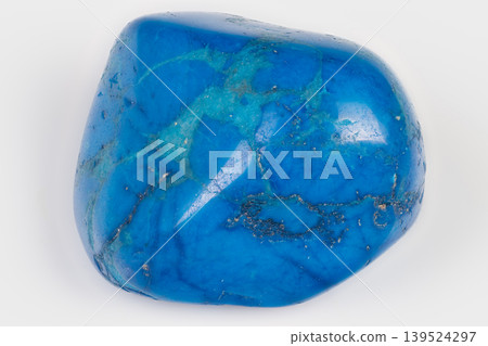 Polished bright blue mineral photograph. Elegant blue stone with glossy smooth surface. Sleek polished azure gemstone captured in studio setting with fine details Polished bright blue mineral photograph. Elegant blue stone with glossy smooth surface. Sleek polished azure gemstone captured in studio setting with fine details 139524297