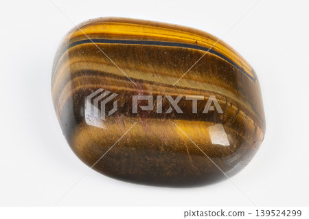 Arrangement of ancient fossils combined with colorful gemstone displays. An exhibition featuring preserved fossils alongside vibrant and polished gemstone collections for viewing 139524299
