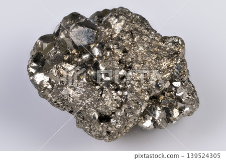 Crystal cluster showcasing refined cubic facets. Sample of pyrite featuring sharp cubic geometries and highresolution textures suitable for geological inspection 139524305