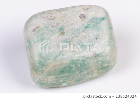 Calm green stone. Smooth polished aventurine with sparkle and calming appeal. Finished green aventurine with subtle shimmer and relaxing aesthetic suitable for selfcare Calm green stone. Smooth polished aventurine with sparkle and calming appeal. Finished green aventurine with subtle shimmer and relaxing aesthetic suitable for selfcare 139524324