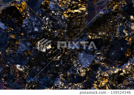 Rugged textured surface with luminous gold veins contrast. Rough textured ore with shining gold veins and subtle matte shadows creating stylish industrial appearance Rugged textured surface with luminous gold veins contrast. Rough textured ore with shining gold veins and subtle matte shadows creating stylish industrial appearance 139524346