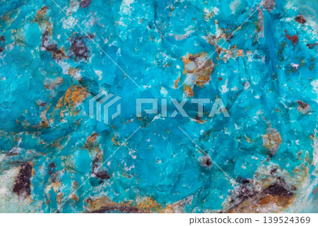 Colorful turquoise with copper details. Vibrant turquoise mineral appearance highlighted with rusted copper accents and mottled aged patina for contemporary interiors 139524369