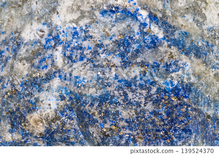Colorful cobalt fragments create artistic decorative features. Handmade cobalt crystal pieces assembled into dazzling mosaic accented by mica particles and brilliant facets 139524370