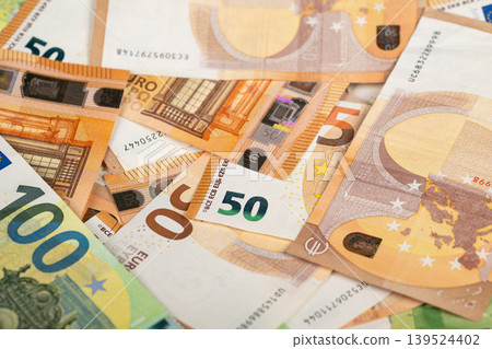 Collection of different euro currencies for worldwide trading and travel. Assortment of euro banknotes in various denominations suitable for international financial operations Collection of different euro currencies for worldwide trading and travel. Assortment of euro banknotes in various denominations suitable for international financial operations 139524402