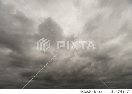 Overcast skies visualized. Overcast weather scene with thick clouds and muted illumination. Cloudy atmospheric view showcasing layered clouds and somber lighting conditions 139524527