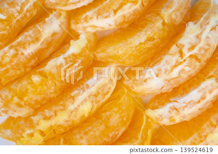 Fresh juicy mandarin closeup for immunity, vibrant antioxidantrich fruit segments layered to illustrate nutrition concept, bright clean backdrop and wholesome tone Fresh juicy mandarin closeup for immunity, vibrant antioxidantrich fruit segments layered to illustrate nutrition concept, bright clean backdrop and wholesome tone 139524619