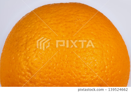 Macro view capturing detailed concentric pattern on orange peel surface. Close detailed macro shot showcasing symmetrical orange peel pattern with vibrant colors and subtle shading Macro view capturing detailed concentric pattern on orange peel surface. Close detailed macro shot showcasing symmetrical orange peel pattern with vibrant colors and subtle shading 139524662