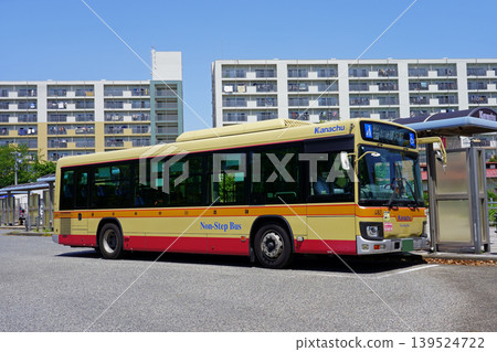 A close-up of a Kanagawa Chuo Bus (old livery/Isuzu Erga) stopped at the bus stop in front of Matano Park. A close-up of a Kanagawa Chuo Bus (old livery/Isuzu Erga) stopped at the bus stop in front of Matano Park. 139524722