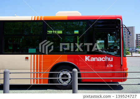 A close-up of the side view of a Kanagawa Chuo Bus (new livery/Mitsubishi Aero Star) waiting at the bus terminal in front of Matano Park. A close-up of the side view of a Kanagawa Chuo Bus (new livery/Mitsubishi Aero Star) waiting at the bus terminal in front of Matano Park. 139524727