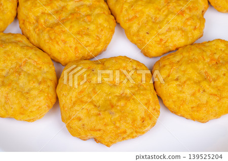 Soft vegan carrot cookie bites. Homemade plantbased carrot cookie rounds. Delicious soft vegan carrot cookies crafted with oats and almonds for healthconscious snackers 139525204