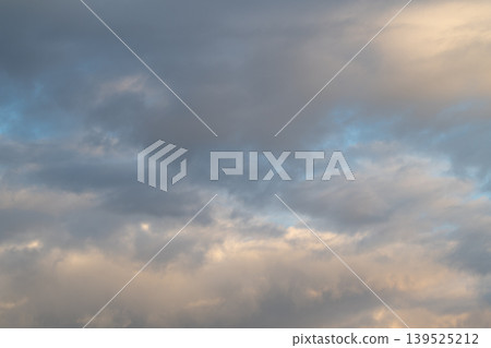 Peaceful morning sky. Serene dawn illuminates peaceful clouds. Calm sunrise bathes tranquil sky hues. Early morning tranquility with soothing light and gentle cloud painting Peaceful morning sky. Serene dawn illuminates peaceful clouds. Calm sunrise bathes tranquil sky hues. Early morning tranquility with soothing light and gentle cloud painting 139525212