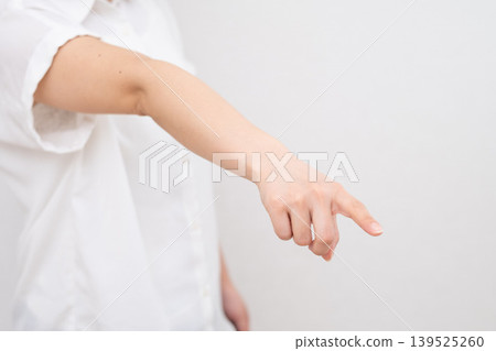 A woman pointing angrily A woman pointing angrily 139525260