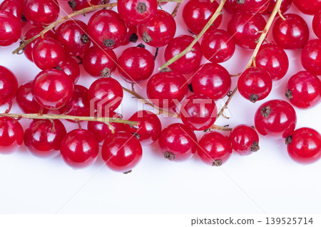 Vivid red berries convey health. Juicy red currants represent vitality and wellness. Fresh red currant berries exemplify antioxidant power and nutritional value Vivid red berries convey health. Juicy red currants represent vitality and wellness. Fresh red currant berries exemplify antioxidant power and nutritional value 139525714