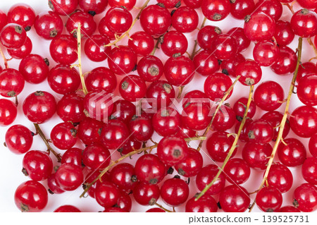 Marketinspired red currant arrangement. Rustic farm fresh currant cluster layout. Charming topdown view of red currant bundles suitable for market display and packaging design Marketinspired red currant arrangement. Rustic farm fresh currant cluster layout. Charming topdown view of red currant bundles suitable for market display and packaging design 139525731
