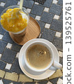 Mango ice cream and hot coffee 139525761