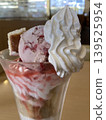 A luxurious reward parfait with strawberries and cheesecake. 139525954