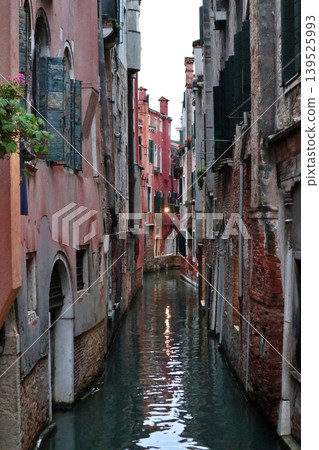 Sunset over the canals in the Castello district of Venice's old town, Italy. Sunset over the canals in the Castello district of Venice's old town, Italy. 139525993