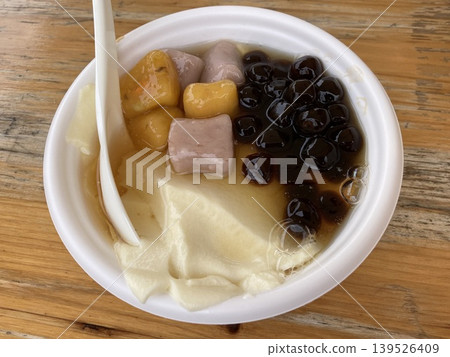 Taiwanese dessert Douhua (tofu pudding) - with tapioca and taro balls Taiwanese dessert Douhua (tofu pudding) - with tapioca and taro balls 139526409