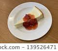 New York cheesecake with strawberry sauce 139526471
