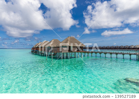 Relaxing Maldives water villa over turquoise ocean, breathtaking sunshine tropical paradise, dreamy luxury overwater retreat, luminous serene island escape 139527189