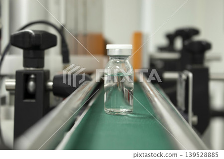 Machine conveyor with glass bottles ampoule Machine conveyor with glass bottles ampoule 139528885