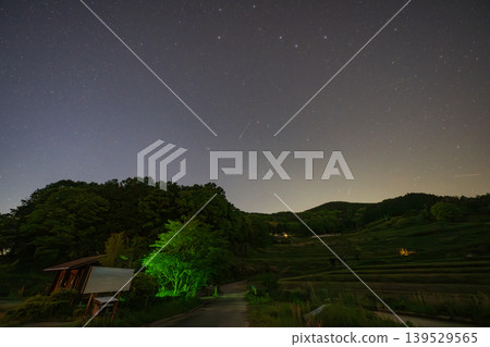The beautiful terraced rice fields at night in Misaki Town, Okayama Prefecture, Japan The beautiful terraced rice fields at night in Misaki Town, Okayama Prefecture, Japan 139529565