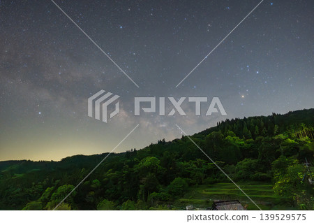 The beautiful terraced rice fields at night in Misaki Town, Okayama Prefecture, Japan The beautiful terraced rice fields at night in Misaki Town, Okayama Prefecture, Japan 139529575