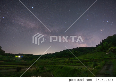 The beautiful terraced rice fields at night in Misaki Town, Okayama Prefecture, Japan The beautiful terraced rice fields at night in Misaki Town, Okayama Prefecture, Japan 139529583