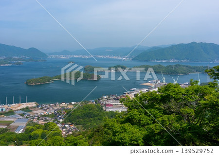 A spectacular view of Innoshima Island and the Seto Inland Sea from the summit of Shirataki Mountain, along the Shimanami Kaido, Hiroshima Prefecture. A spectacular view of Innoshima Island and the Seto Inland Sea from the summit of Shirataki Mountain, along the Shimanami Kaido, Hiroshima Prefecture. 139529752