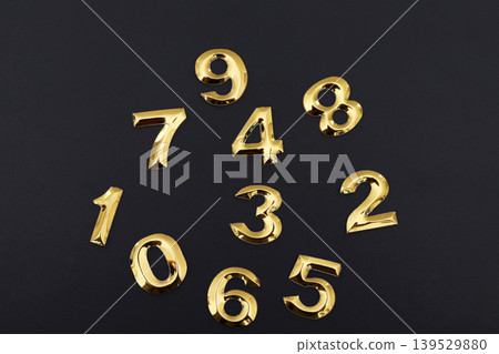 Numbers on a black background Numbers on a black background 139529880