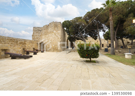 the historic cannons in the inner courtyard of the castle in Larnaka, Cyprus 139530098