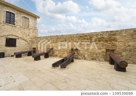 the historic cannons in the inner courtyard of the castle in Larnaka, Cyprus the historic cannons in the inner courtyard of the castle in Larnaka, Cyprus 139530099