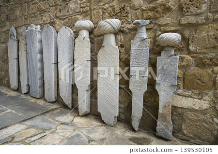 some stone steles with ancient inscriptions from the inner courtyard of the castle of Larnaka, Cyprus some stone steles with ancient inscriptions from the inner courtyard of the castle of Larnaka, Cyprus 139530105