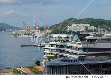 A view of the surrounding area from the Nagasaki Marriott Hotel, including Nagasaki Port, Mt. Inasa, and JR Nagasaki Station (taken in May 2026). A view of the surrounding area from the Nagasaki Marriott Hotel, including Nagasaki Port, Mt. Inasa, and JR Nagasaki Station (taken in May 2026). 139530155