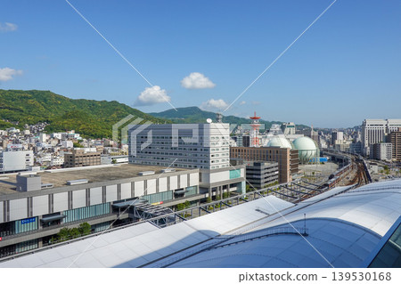 A view of the surrounding area from the Nagasaki Marriott Hotel, including Nagasaki Port, Mt. Inasa, and JR Nagasaki Station (taken in May 2026). A view of the surrounding area from the Nagasaki Marriott Hotel, including Nagasaki Port, Mt. Inasa, and JR Nagasaki Station (taken in May 2026). 139530168