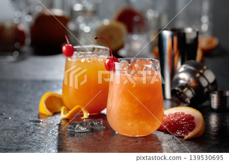 Summer refreshing cocktails with ice, orange and grapefruit juice. 139530695