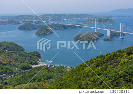 A spectacular view of the Kurushima Kaikyo Bridge and the islands of the Seto Inland Sea from Kirosan Observation Park, part of the Shimanami Kaido, Imabari City, Ehime Prefecture. A spectacular view of the Kurushima Kaikyo Bridge and the islands of the Seto Inland Sea from Kirosan Observation Park, part of the Shimanami Kaido, Imabari City, Ehime Prefecture. 139530811