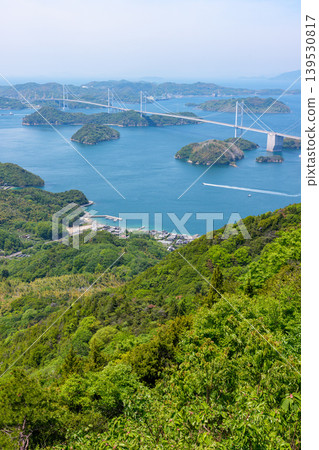 A spectacular view of the Kurushima Kaikyo Bridge and the islands of the Seto Inland Sea from Kirosan Observation Park, part of the Shimanami Kaido, Imabari City, Ehime Prefecture. A spectacular view of the Kurushima Kaikyo Bridge and the islands of the Seto Inland Sea from Kirosan Observation Park, part of the Shimanami Kaido, Imabari City, Ehime Prefecture. 139530817